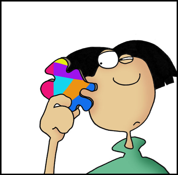 Unifying Paragraphs Student holding a colorful puzzle piece